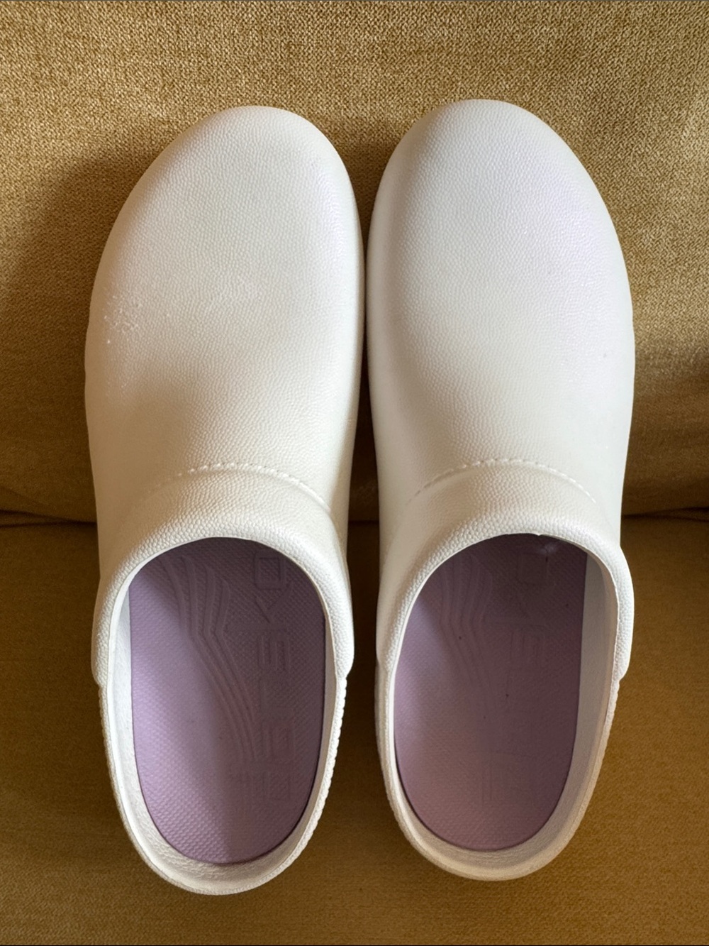 Dansko White Slip-On Clogs with Lavender Insole